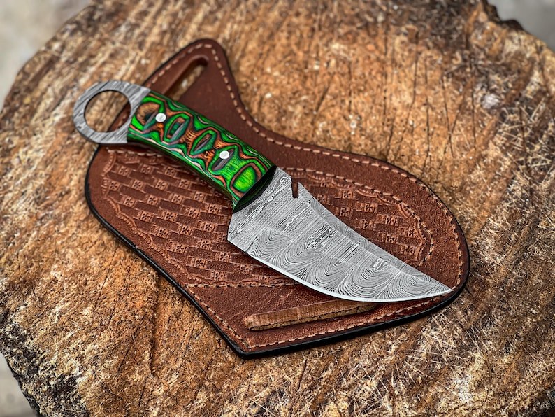 Damascus finger-hole skinner